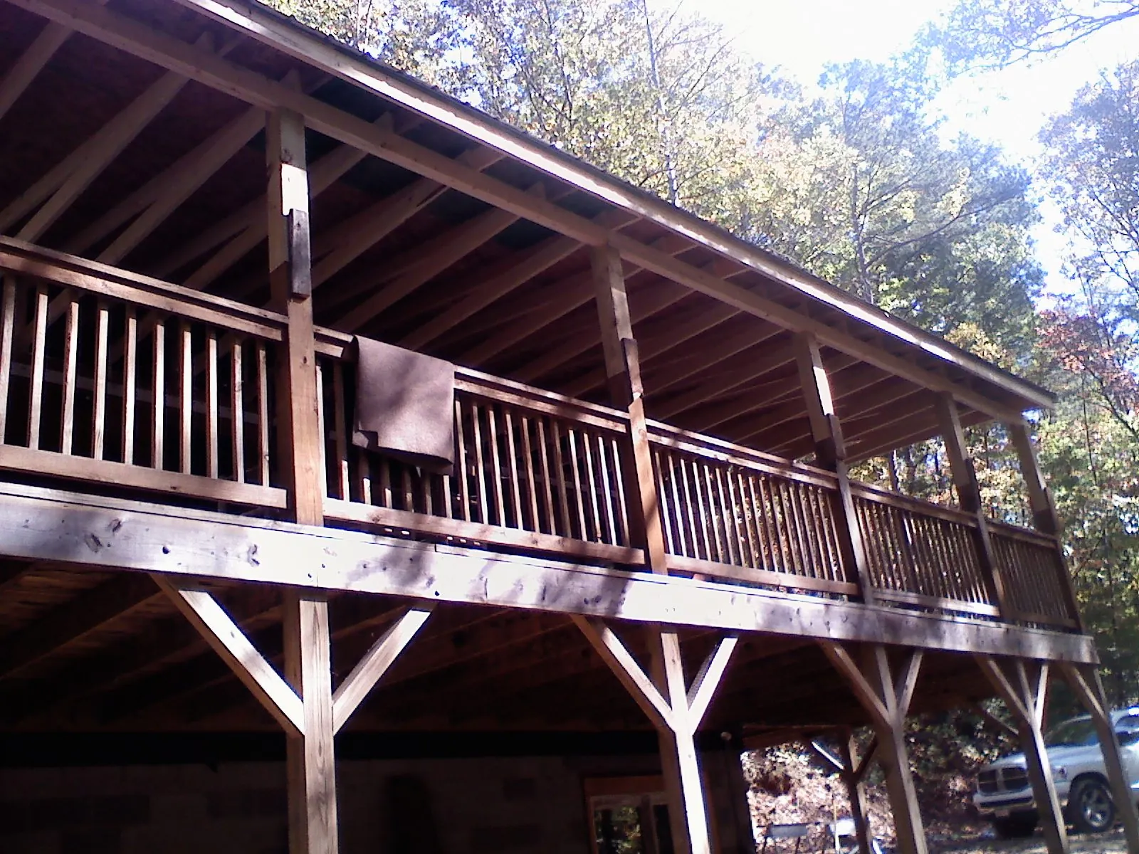 Timber framing under a new elevated porch and deck — Roof Leak Repair in Marstons Mills by Roofing Brothers